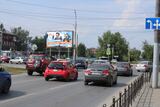 Реклама на призматроне на пересечении Богдана Хмельницкого и Масленникова в Омске