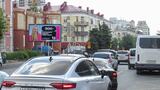 Реклама на призматроне на Герцена, 44 в Омске