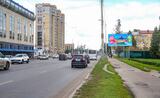 Реклама на билборде на Красном Пути, напротив дома 101 в Омске
