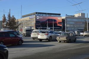Реклама на медиафасаде на Герцена, 1 в Омске
